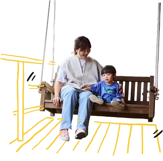 ブランコに乗る親子の画像